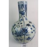 A large Chinese blue and white ceramic bottle vase, probably 20th century, painted underglaze,