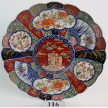 A late Japanese Export Imari porcelain charger, c.