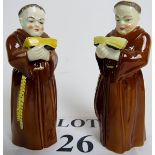 A pair of Royal Worcester porcelain candle snuffers, modelled a Friars, 20th century,