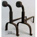 A pair of Arts & Crafts wrought iron fire dogs est: £30-£50