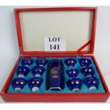 A set of Chinese libation cups and matching porcelain rice wine decanter, in original box,