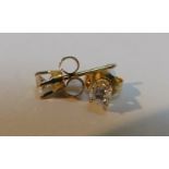 A pair of 15ct gold diamond stud earrings, approx. 0.