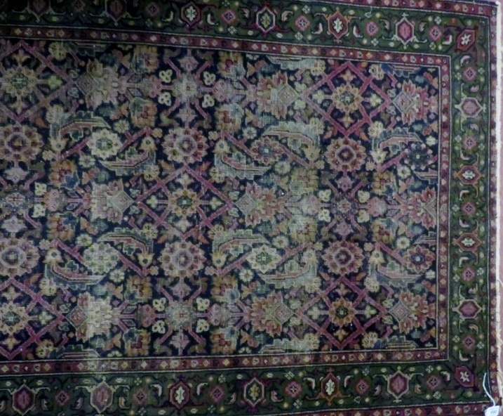 An early-mid 20th century Persian part silk rug,