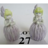 A pair of Royal Worcester porcelain candle snuffers, titled 'Hush', depicting young girls,