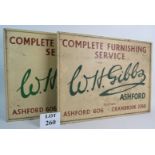 A pair of vintage wooden signs 'W.H.