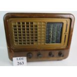 An Art Deco Sobell walnut cased radio, with bakelite knobs,