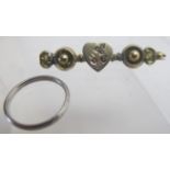 A bar brooch with heart design and set with garnets & seed pearls and a platinum wedding ring est: