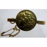 A half Sovereign bar brooch dated 1912 est: £75-£100