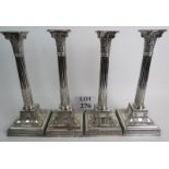 A set of 4 good quality 19th century silver plated candlesticks, weighted bases,