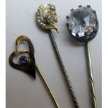 An amethyst heart shaped stick pin,