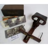 A Victorian stereoscopic viewer and cased collection of cards,