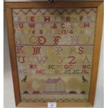 A Victorian era sampler, dated 1874, decorated with a house and birds, trees,