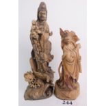 Two Chinese carved wooden figures, depicting Guanyin, age unknown, 48cm and 38cm high,