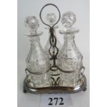 A 19th century silver plated and cut glass three-bottle cruet set est: £20-£40