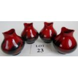 Four Royal Doulton 'Flambe Veined' vases, number 1605,