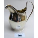 A Georgian silver cream jug, London 1803, approx 3.