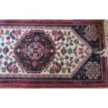 An unclipped Karak small runner Abadeh rug, zoomorphic and persepholis motifs,