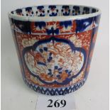 A large Japanese Imari porcelain jardiniere, c.