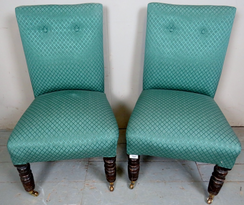 A pair late Victorian chairs upholstered