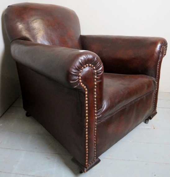 A 20th Century club chair upholstered in