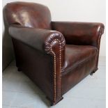 A 20th Century club chair upholstered in