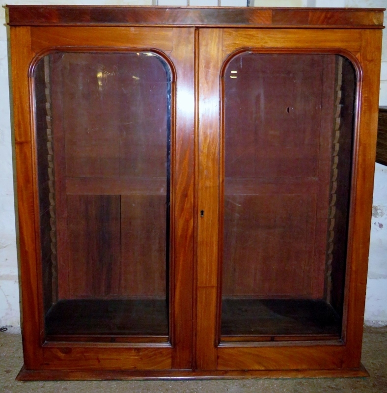 A Victorian mahogany bookcase top with g