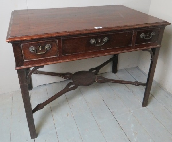 A fine Georgian mahogany lowboy with a l