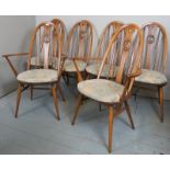 A set of six Ercol dining chairs to incl