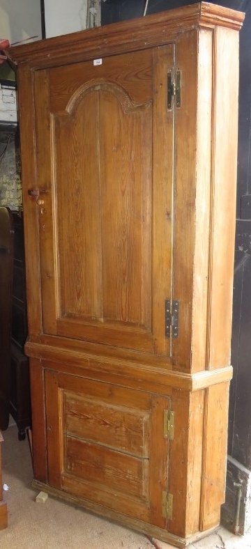 A 19th Century stripped pine tall corner