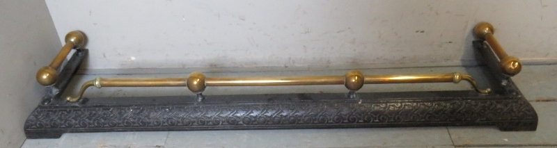 A 19th Century cast metal fire fender wi