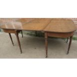 A 19th Century mahogany dining table wit