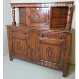 A 20th Century oak court cupboard with a