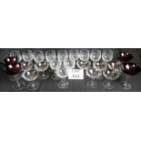 Twelve cut glass wine glasses, plus twel