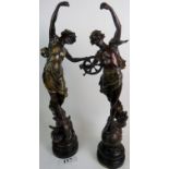 A pair of French bronzed spelter figures "Le Jour" and "La Nuit", c1900,