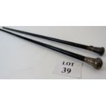 Two silver topped walking canes, (a/f), both with rubbed hallmarks, probably late Victorian,