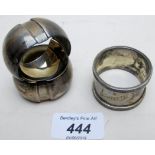 A pair of silver napkin rings Birmingham 1931 and another silver napkin ring Sheffield,