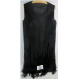An Art Deco 'Flappers' cocktail dress in black est: £30-£50