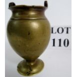 An antique Chinese bronze urn form vase, of archaic form and likely of period, 11cm high.