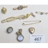 An assortment of items to include bar brooches and 2 antique seals.