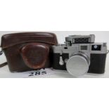 A c1960's Leica M3 camera, number 784383, and Leica meter,
