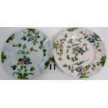A pair of 19th century continental tin glazed Faience ceramic plates, probably Italian,