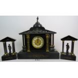 A 19th century patinated gilt-metal mounted marble cased three piece clock garniture of Romanesque