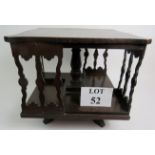 An Edwardian oak table-top revolving book stand,