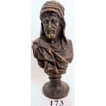 A bronzed cast metal bust after the antique, modelled as a male Arabic figure on socle base,