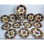 A superb Royal Worcester fruit painted porcelain 14 piece dessert service, c1920,