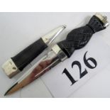 A Scottish Dirk (Highlanders Knife), with stainless steel blade, carved wooden handle,