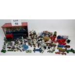 A collection of early 20th century painted lead farm set toys, model cars, and similar,