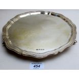 A silver salver with pie crust edge, Sheffield 1961,