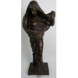 A large bronze statue after Barrias, cast as a semi-naked classical maiden, 78cm high.