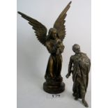 An early 20th century vintage bronzed spelter sculptural flower holder modelled in the form of an